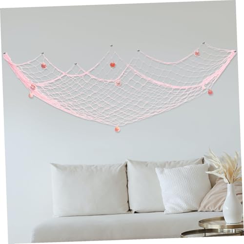Red de pesca decorativa mediterránea que transforma paredes con conchas naturales 7