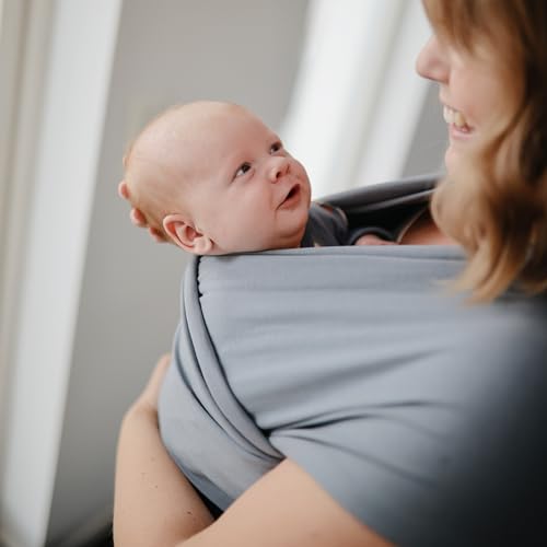 mushie Baby Wrap Carrier | Organic Cotton and Elastane | Infant Sling for Newborn and Babies 8-35 lbs (Tradewinds)