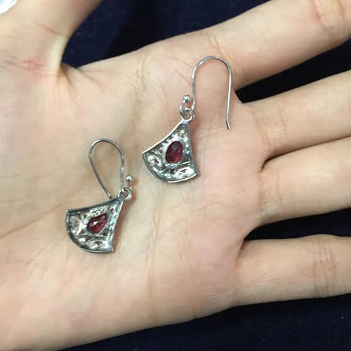 Boucles d'oreilles grenat pendantes pour sublimer vos soirées