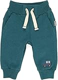El pantalón se compone de color petróleo francés cepillado