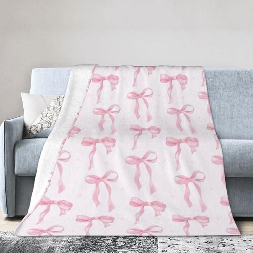 Couverture douillette en flanelle rose pour vos soirées canapé cosy