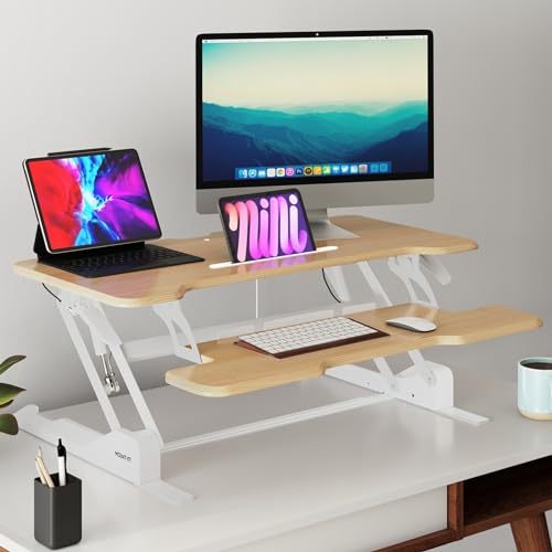 Image of Mount-It! Height Adjustable Standing Desk Converter, 38 inch Wide, Desk Riser for 2 Monitors, Manual Gas Spring Sit Stand Desktop Raises to 16.9 inch, Fits Two Monitor Screens with Keyboard Mouse Tray Maple