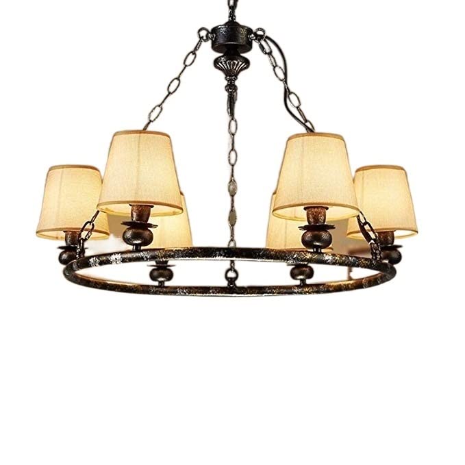 Lustre en fer forgé 6 lampes pour corriger l'éclairage agressif d'un salon ou restaurant