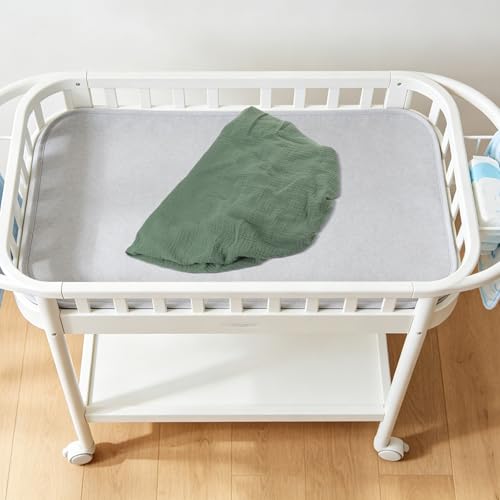 Matelas à langer vert lot de 2 pour simplifier la routine de change sur la commode