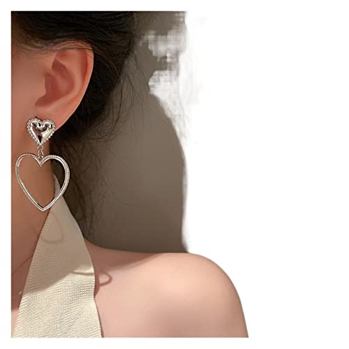 Boucles d'oreilles pendantes coeur creux le bijou femme idéal pour vos soirées
