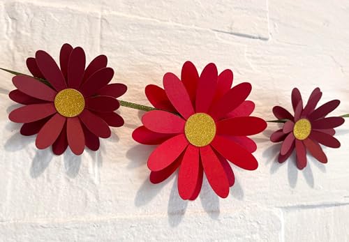 Image of Red Daisy Flower Wall and Party Decor. This Easy Decor kit Comes with 18 Paper Flowers, Needle, 10 feet Satin Ribbon and Sticky Foam Squares.