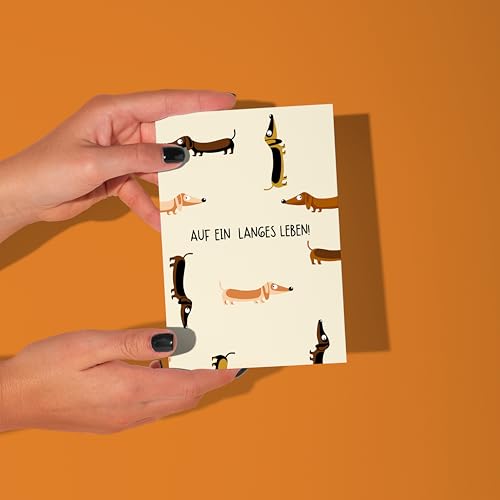 Dackel Geburtstagskarte mit Kraftpapierumschlag – Lustige Klappkarte mit Spruch „Auf ein langes Leben“ – für Männer, Frauen, Freunde & Hundeliebhaber – DIN A6
