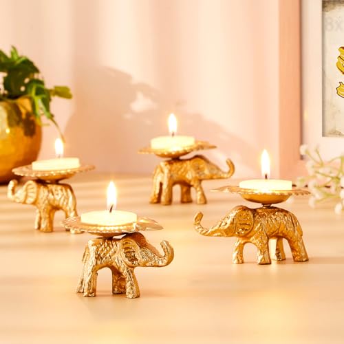 Image of Amazon Brand - Solimo Decorative Handcrafted Metal Elephant Diya for Puja | Tealight Candle Holder for Home Decor & Gifting (Pack of 4) | 8 x 6.5 x 4.5 cm Each | Gold Finish