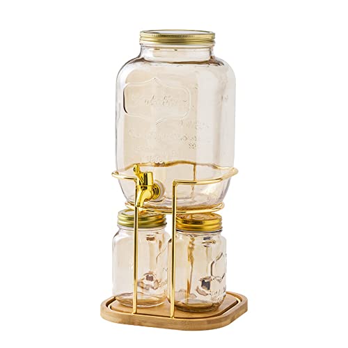 Distributeur de boisson en verre sculpté et son service de verres de table raffinés