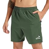 Ce short de sport de couleur unie présente une coupe standard, une taille élastiquée avec cordon de serrage réglable et deux poches zippées pour éviter que votre téléphone, vos cartes, vos objets de valeur ou votre lecteur MP3 ne tombent pendant l'entraînement.