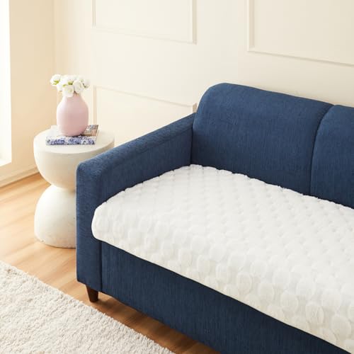 Image of Amazon Basics Quilted Sofa Cover for Two Seater, Playful Polka Dots, Non-Slip Sofa Pad, 70x120 cm, Soft Silicone Grip Dots, 100% Polyester, Machine Washable - Off-White