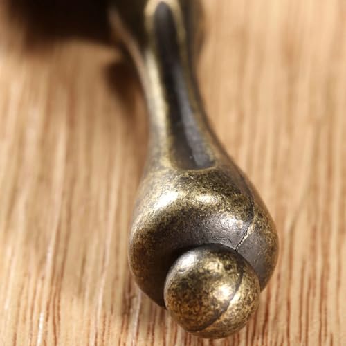 Tirador de bronce para sustituir pomos desgastados en armarios de cocina 7