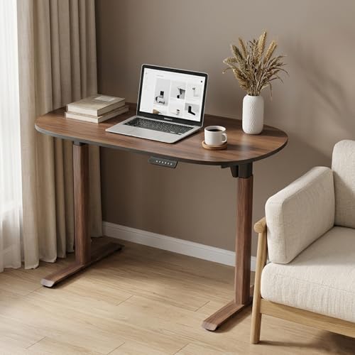 Image of Electric Standing Desk 55x24, One-Piece Walnut Desktop, Height Adjustable Sit Stand Workstation with Quiet Motor & Memory Presets, Oval Leg Home Office Standing Desk, Anti-Collision, Minimalist Design