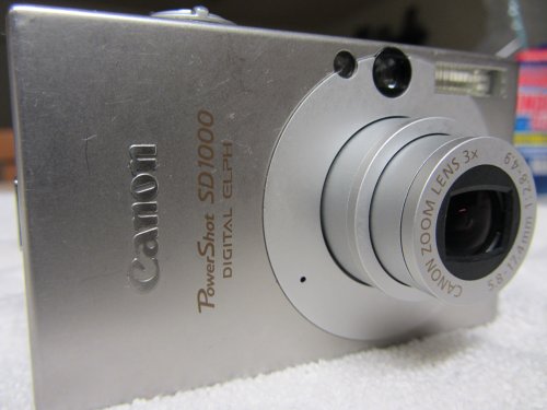 Canon PowerShot SD1000 7.1MP Digital Elph Camera 3x Optical Zo