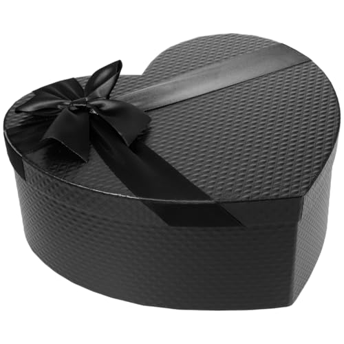 Boîte cadeau vide en forme de cœur pour une table de Saint-Valentin romantique