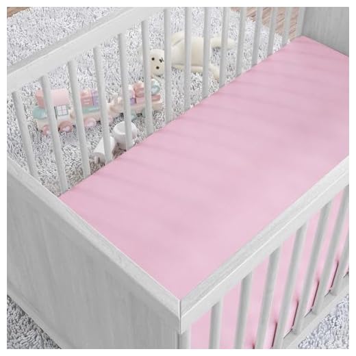 Amazon Basics 100% Cotton Jersey Knit Fitted Crib Sheet for Boys and Girls, fits Standard Crib and Toddler Mattress, Breathable, Super Soft, 28 x 52 Inches, Pink