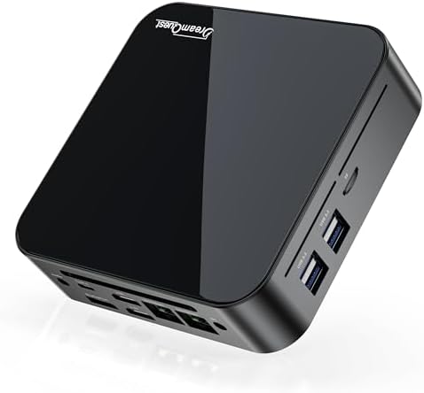 DreamQuest Mini PC with compact square design and matte finish on a desk
