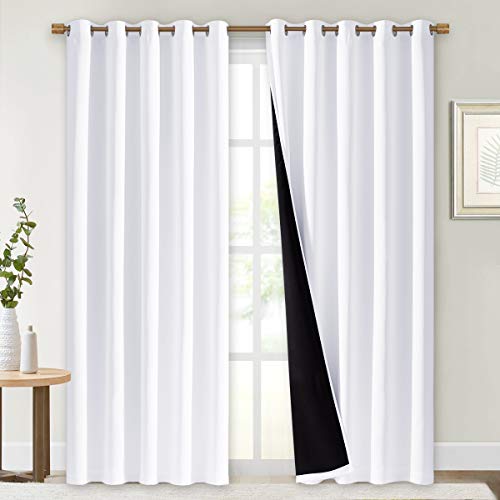 Image of NICETOWN 100% Blackout Window Curtain Panels, Cold and Full Light Blocking Drapes with Black Liner for Nursery, 84 inches Drop Thermal Insulated Draperies (White, 2 Pieces, 70 inches Wide Each Panel)