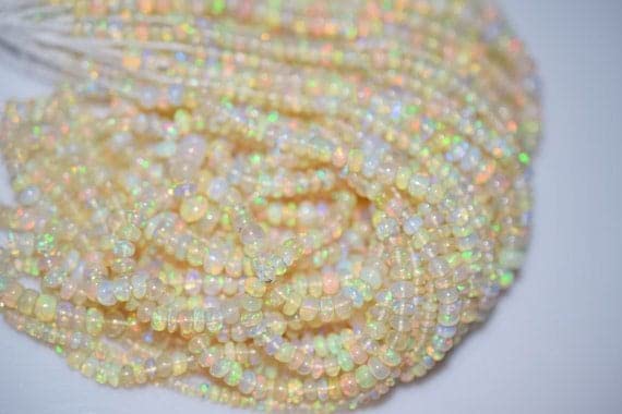 Perles opale d'Éthiopie rondelles lisses 4.30 mm pour bijoux fins qui ne griffent pas
