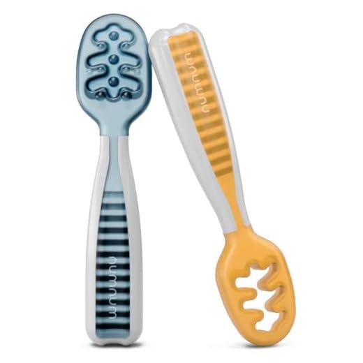 NumNum Precucharas de Aprendizaje Para Bebés, Juego de 2 Cucharas de Silicona (Etapa 1 + Etapa 2), #1 Recomendada por Nutricionistas y Expertos Baby Led Weaning, Ideal Blw, Naranja/Azul