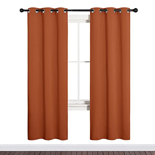 Image of NICETOWN Blackout Curtain Panels for Girls Room, Nursery Essential Thermal Insulated Solid Grommet Top Blackout Drapes (Burnt Orange, 1 Pair, 34 x 72 inches)
