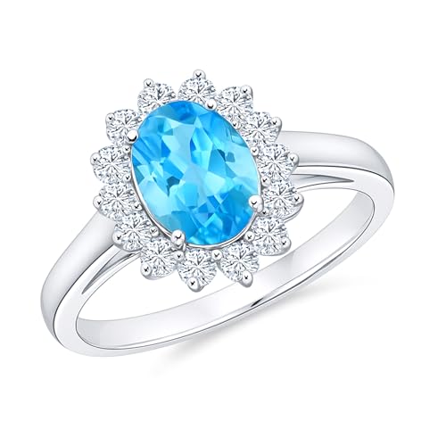 Bague topaze bleue argent 925 halo d'oxydes de zirconium haute joaillerie