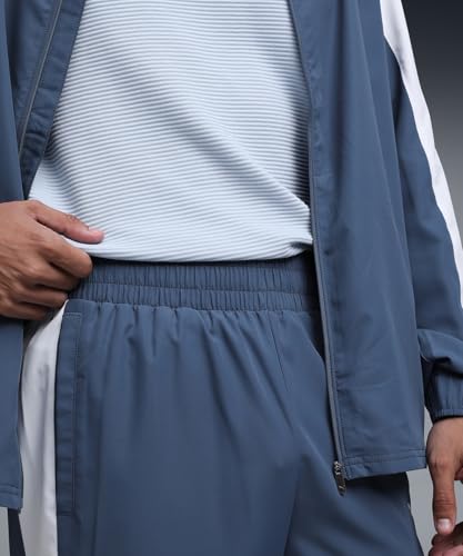 Image of Puma | Essentials Men's Sweat-Wicking Woven Tracksuit | Dark Indigo | M
