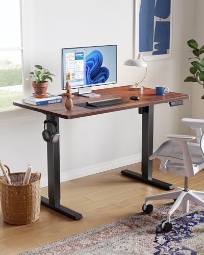 HUANUO 63" x 28" Electric Standing Desk Adjustable Height, 4 Memory Height Settings, Headphone Hook, Cable Manager, Sit Stand Up Desk for Home Office & Computer Workstation, Walnut