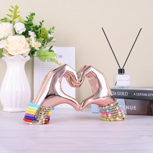 Estatua decorativa de corazón y mano en resina rosa miniatura 4