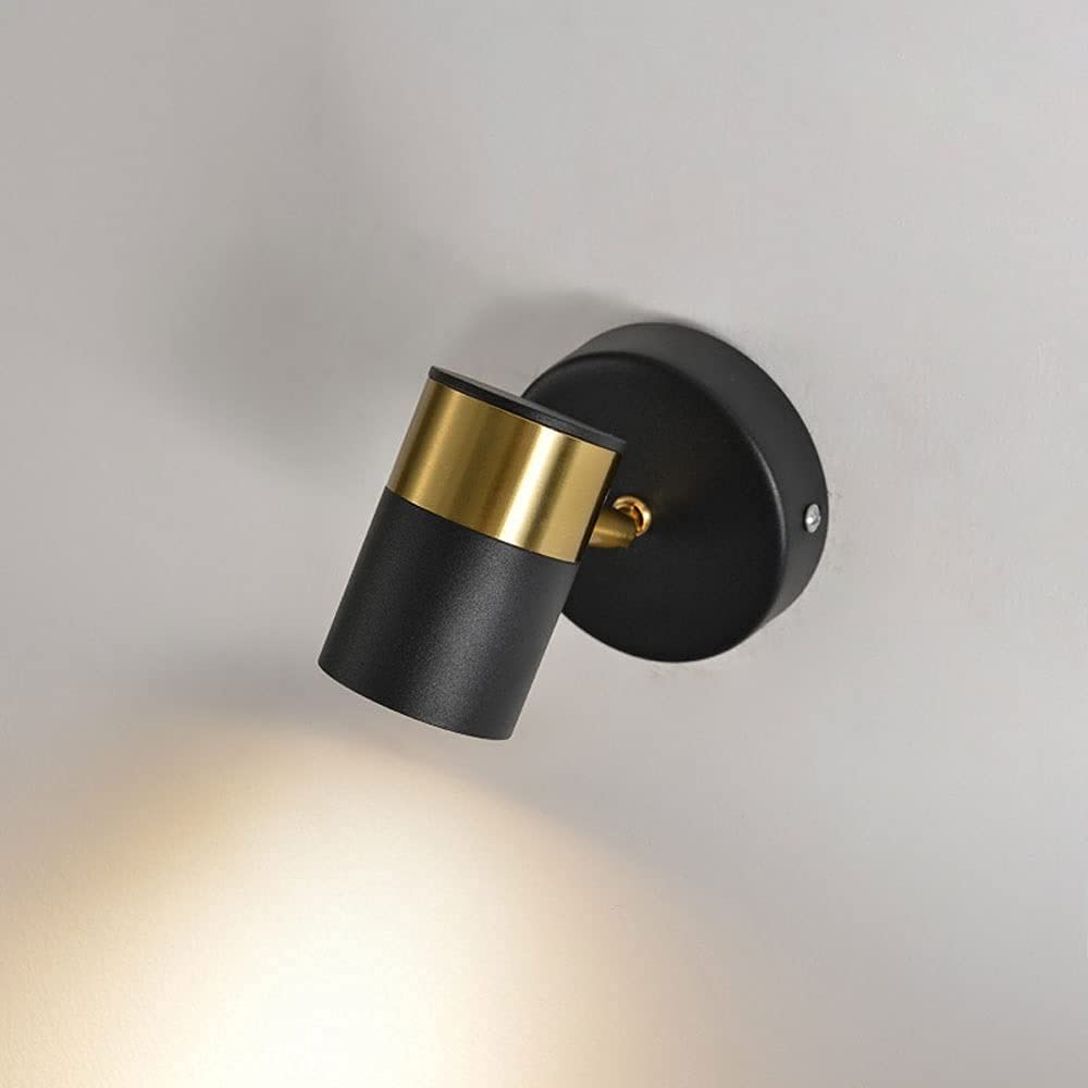 Luz de pared de metal con foco giratorio para una iluminación de oficina flexible y cómoda