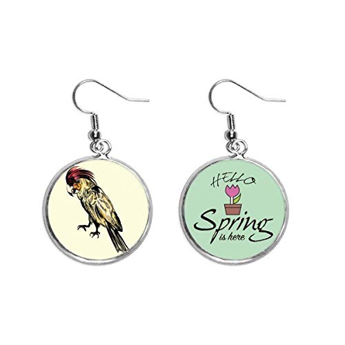 Pendientes de loro con pluma amarilla para lucir en paseos de primavera