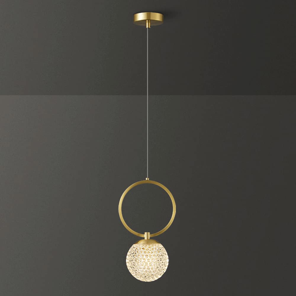 Lámpara de araña de cristal para dormitorio que transforma ambientes con luz de latón cálida