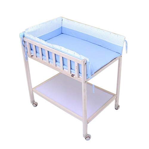 cot and changing table