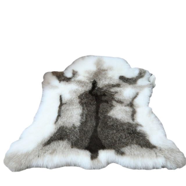 Tapis de renne en fausse fourrure doux pour eviter le sol froid de la chambre
