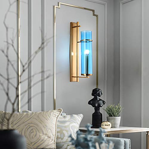 Applique murale en verre bleu pour une ambiance de chevet de chambre et canapé salon