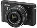 Produktbild Nikon 1 J1 Systemkamera (10 Megapixel, 7,5 cm (3 Zoll) Display) schwarz inkl 1 NIKKOR VR 10-30 mm Objektiv