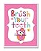 The Kids Room by Stupell Brush Your Teeth with Owl on Pink Back Background Rectangle Wall Plaque