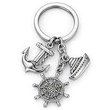 Porte-clés Thème Aventure Maritime – Ce porte-clés argent magnifiquement travaillé comporte trois breloques nautiques complexes : une ancre classique avec une chaîne en cascade, une roue de navire détaillée avec motifs de cordage et accents diamant, et un design de navire à plusieurs niveaux avec pont clair et détails de fenêtres. Parfait pour quiconque est attiré par l'esprit de l'océan.