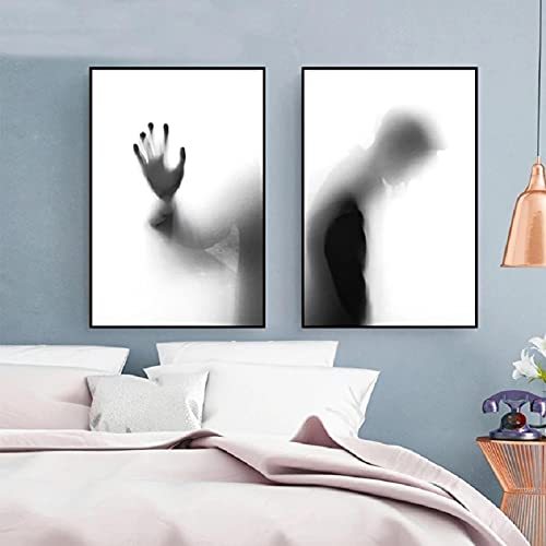 Peinture sur toile pour habiller un mur vide avec un duo scandinave noir et blanc moderne