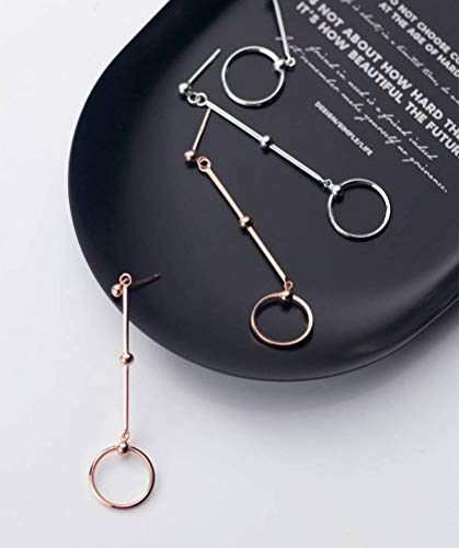 Pendientes largos de moda femenina para estilizar el rostro con dulzura 7
