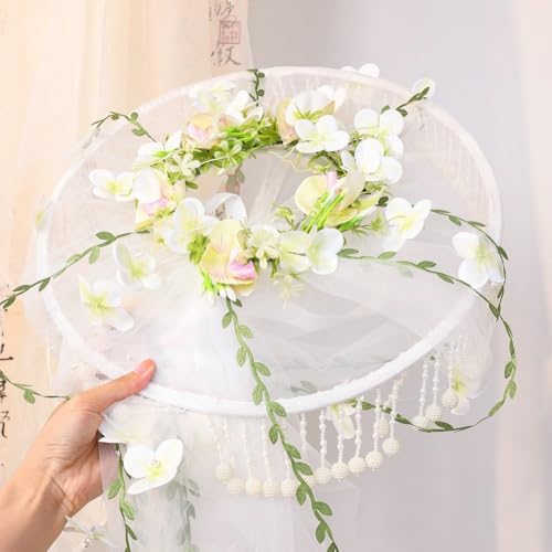Chapeau à voile fleuri doté d'un rideau à pompons perlés traditionnels
