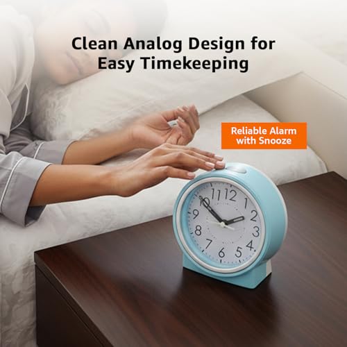 Image of Amazon Basics Analog Table Clock with Alarm and Snooze, Silent Operation, Manual Brightness, ABS, Light Blue, Battery Operated Design for Home, Desk or Office Use (Size: 11.5 x 12.4 x 5.4 cm)
