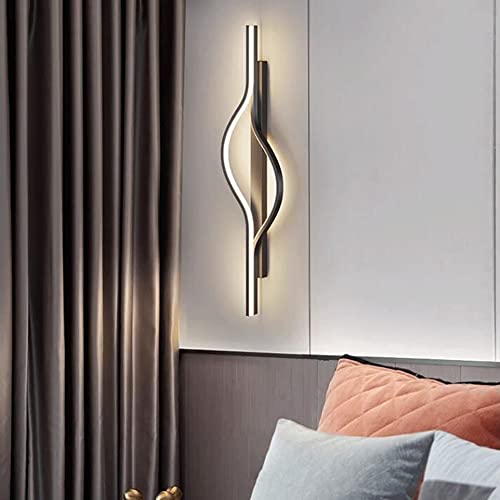 Aplique de pared junto a la cama negro con acabado metálico premium 8