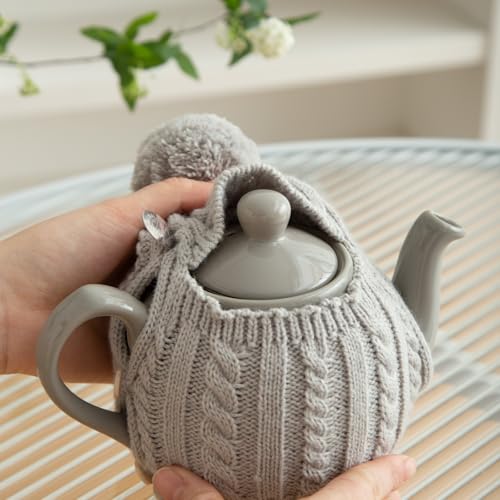 Image of One-Piece Cable Knit Teapot Cozy with Pom Pom Top, Acrylic Insulated Tea Pot Cover with 2 Button Fasteners & Lid Opening, British Style Hot Cold Insulator for 2 Cup 15-20oz Teapots,gray
