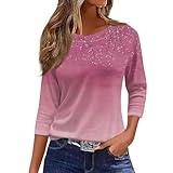 Dispose d'un col rond classique et de manches 3/4, créant un design basique intemporel qui sert de base polyvalente pour créer diverses tenues décontractées.