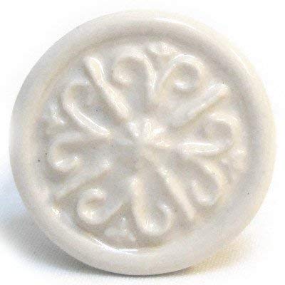 Pushka Home Ceramic Stamp Design Cupboard Door Knob. Sold individually. Vintage style cupboard knobs with a white textured design. 35mm handles suitable for decorating your furniture doors such as cupboards, cabinets, and wardrobes. White drawer pull comes with a fixed in standard screw, two nuts and one washer. Suits door thickness up to 25mm. Made from hardwearing porcelain. Shabby chic door knob is perfect for minimalist interiors, white furniture and many other interior décor styles.