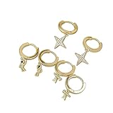 Juego de aretes de aro en tono dorado con dijes de estrella y astronauta, mini aros con detalles de cristal para piercings de oreja