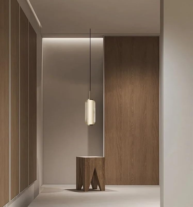 Lampe LED suspendue en verre pour illuminer la salle à manger