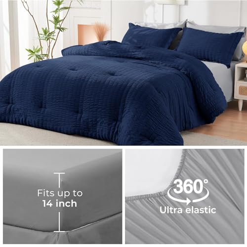 Image of HYMOKEGE Navy Blue /Light Grey King Size Comforter Set Seersucker 7 Pieces, All Season Luxury Bed in a Bag for Bedroom, Bedding Set with Comforter, Sheets, Pillowcases & Shams