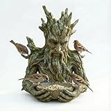 The Quiet Offering A Tree-Integrated Bird Feeding Sculpture Tree Faces Decor...